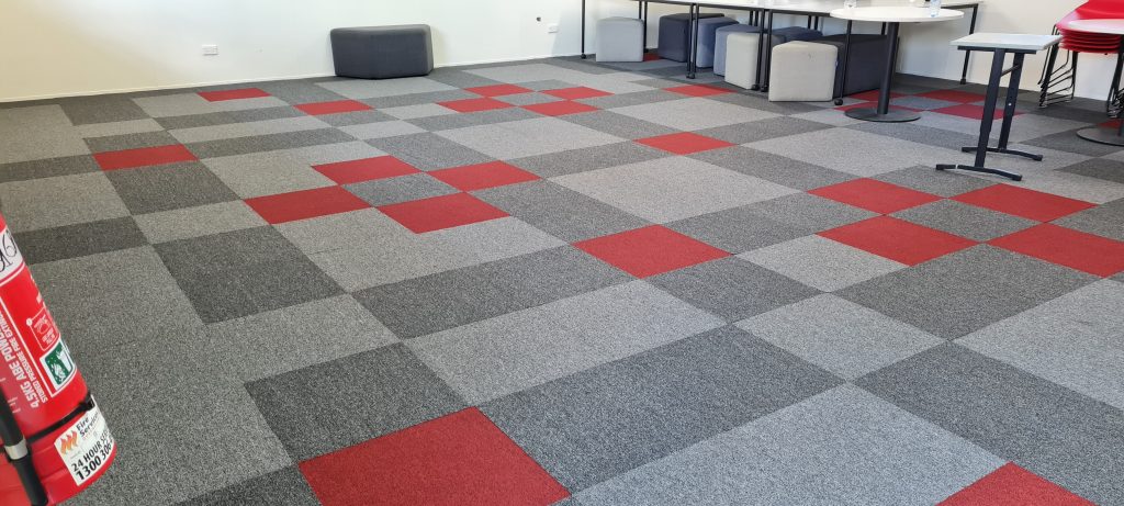 red and grey carpet tiles